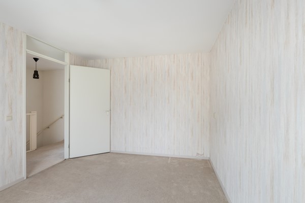 Foto - Te koop: Ruime dubbele benedenwoning met parkeerplaats!